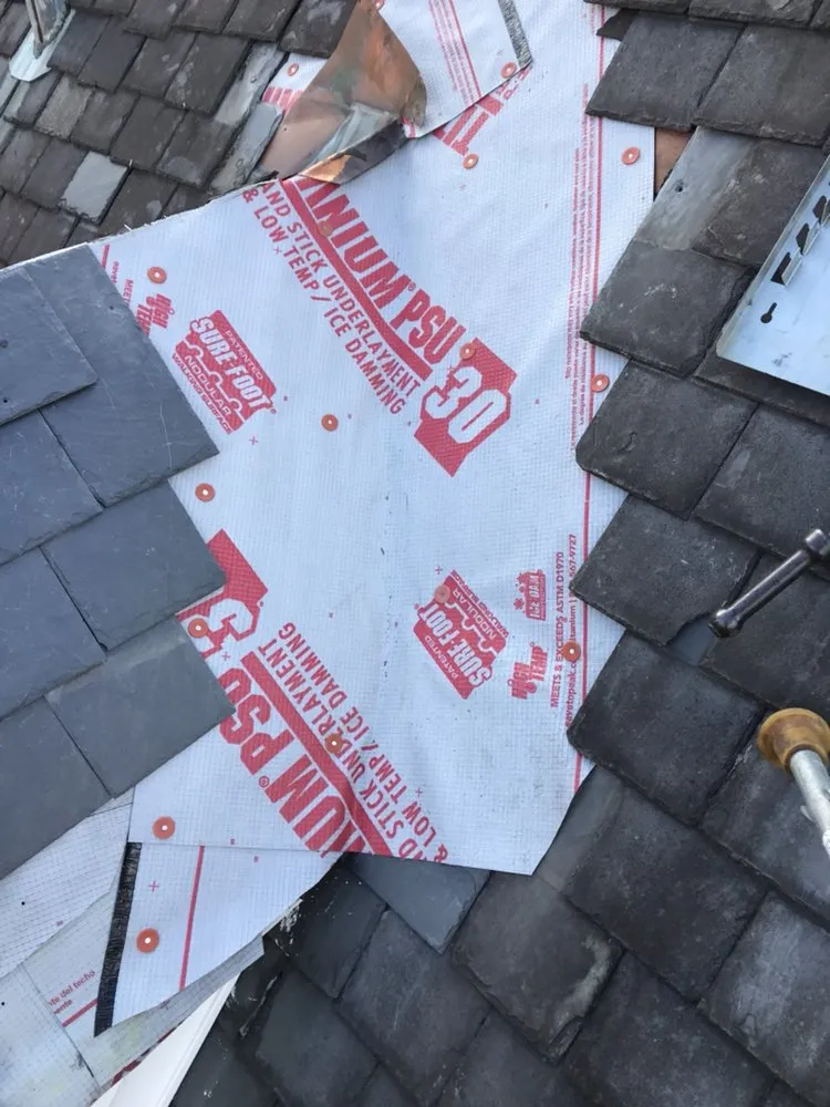 Slide of Hoover Roofing