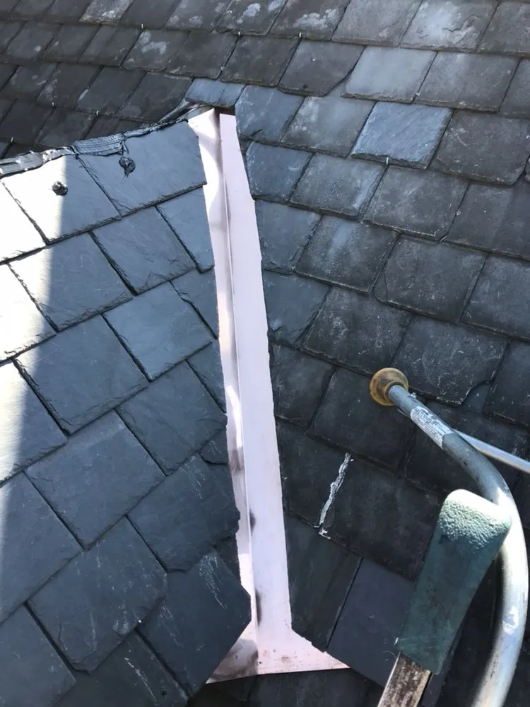 Slide of Hoover Roofing