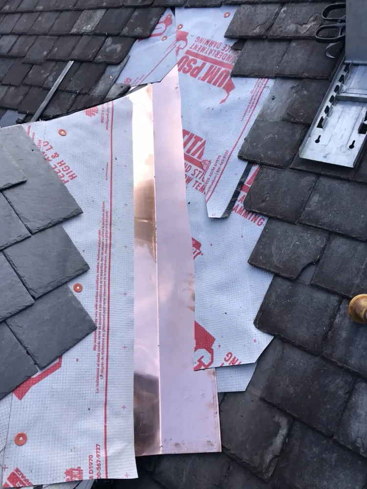 Slide of Hoover Roofing