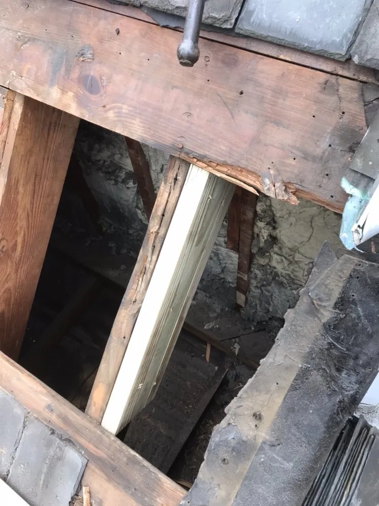 Slide of Hoover Roofing