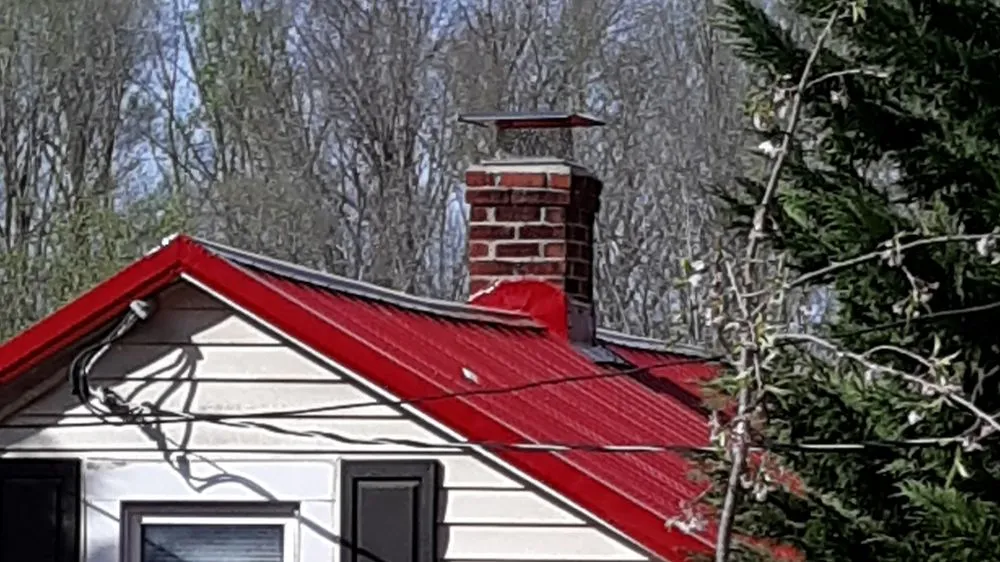 Slide of Hope's Metal Roofing