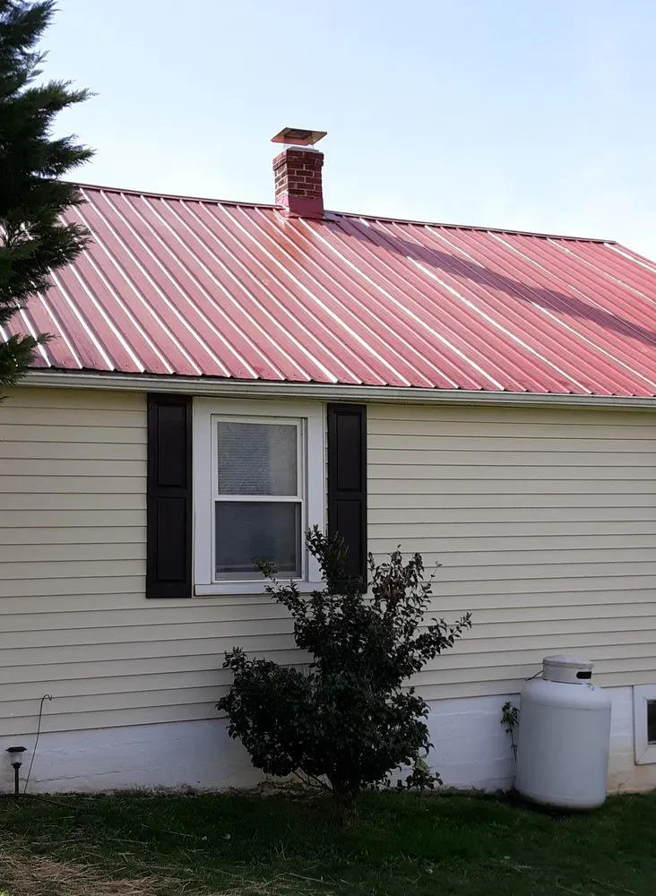 Slide of Hope's Metal Roofing