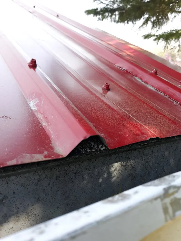 Slide of Hope's Metal Roofing