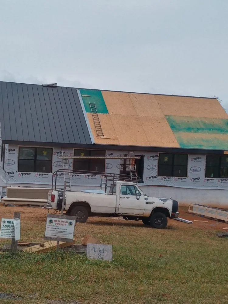 Slide of Hostetter's Roofing