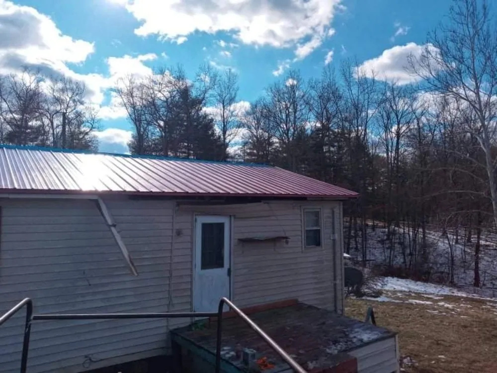 Slide of Hostetter's Roofing