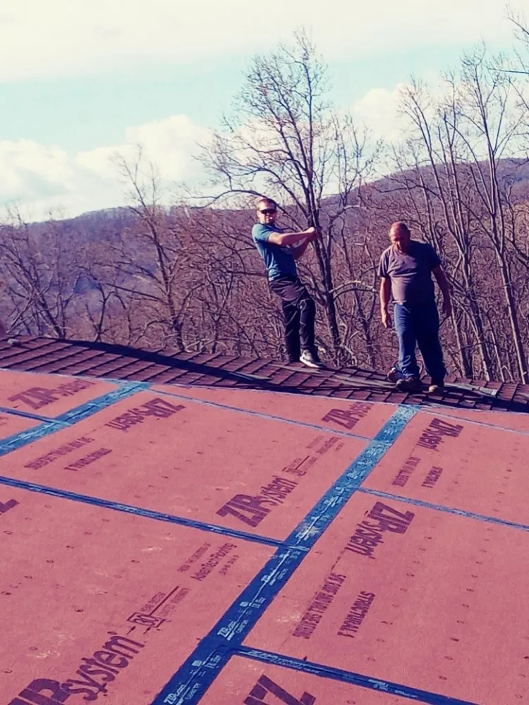 Slide of Hostetter's Roofing