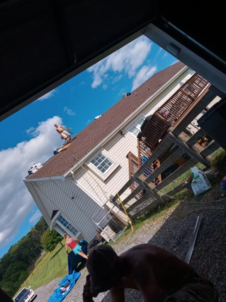 Slide of Hostetter's Roofing