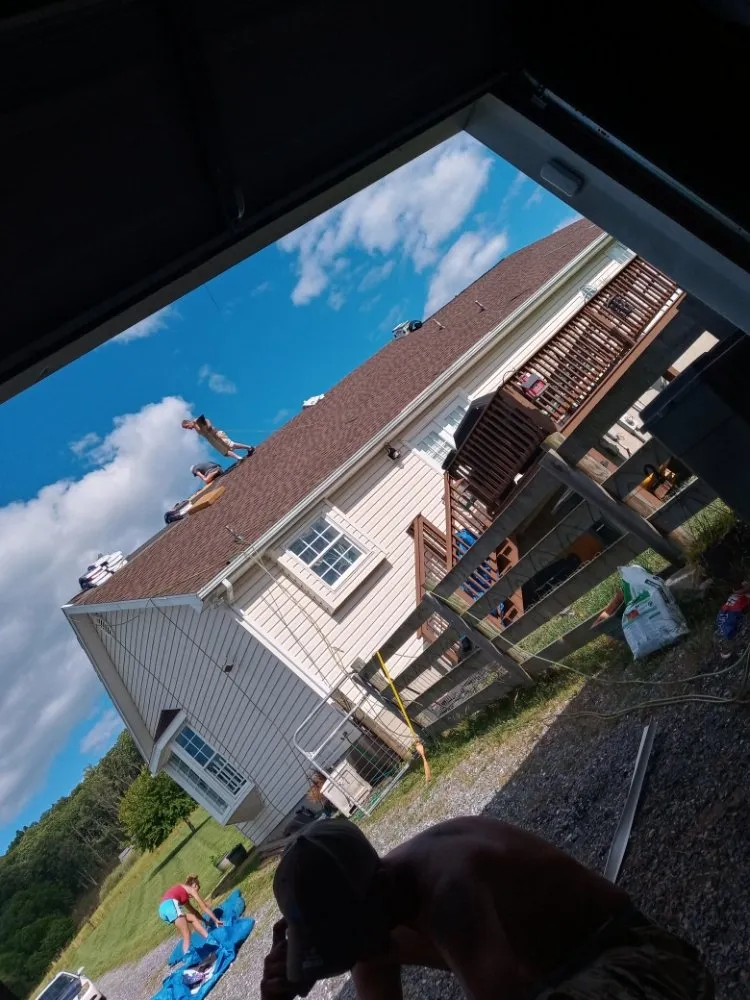 Slide of Hostetter's Roofing