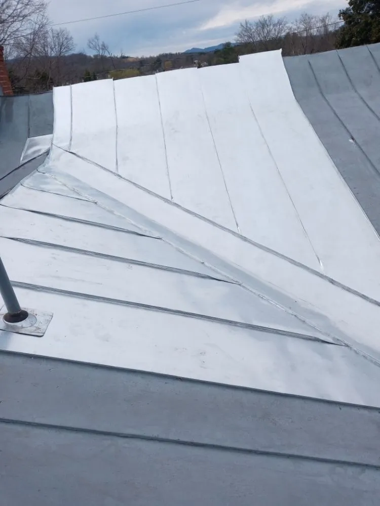 Slide of Hostetter's Roofing