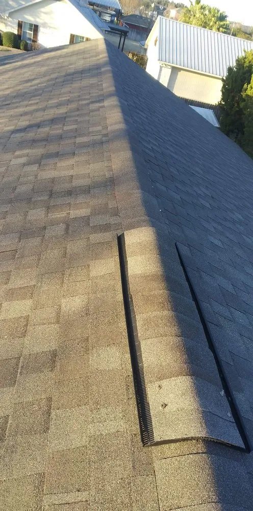 Slide of Hot Top Roofing