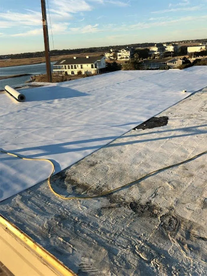 Slide of Hound Roofing