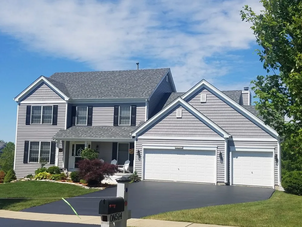 Slide of House Toppers Exteriors