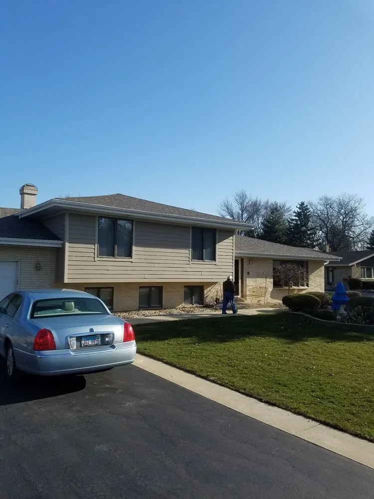 Slide of House Toppers Exteriors