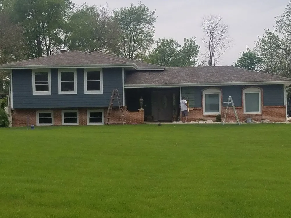 Slide of House Toppers Exteriors