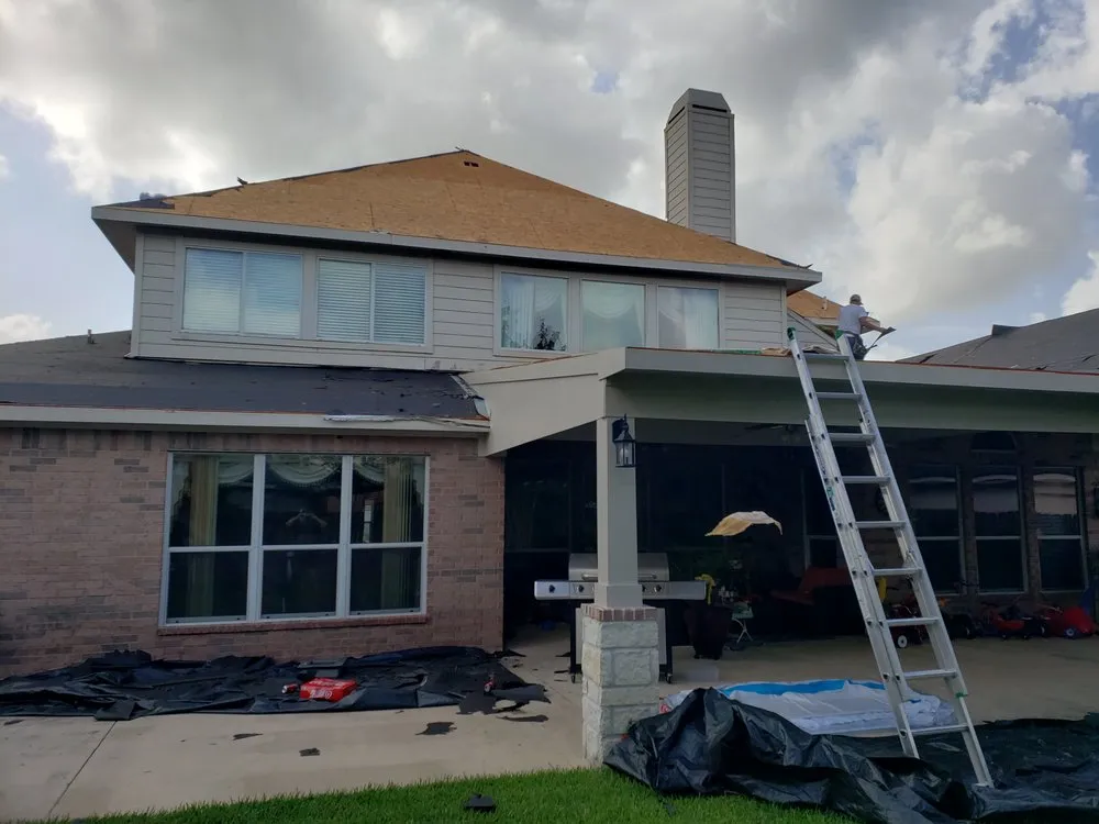 Slide of Houser Roofing