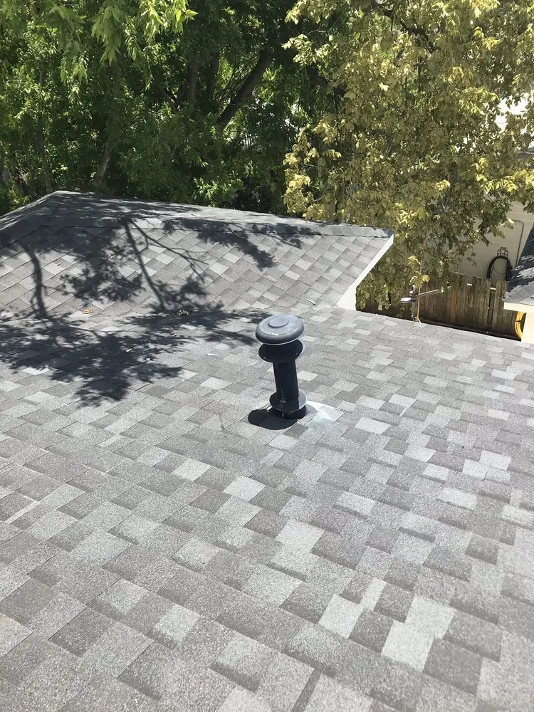 Slide of Houston Heights Roofers