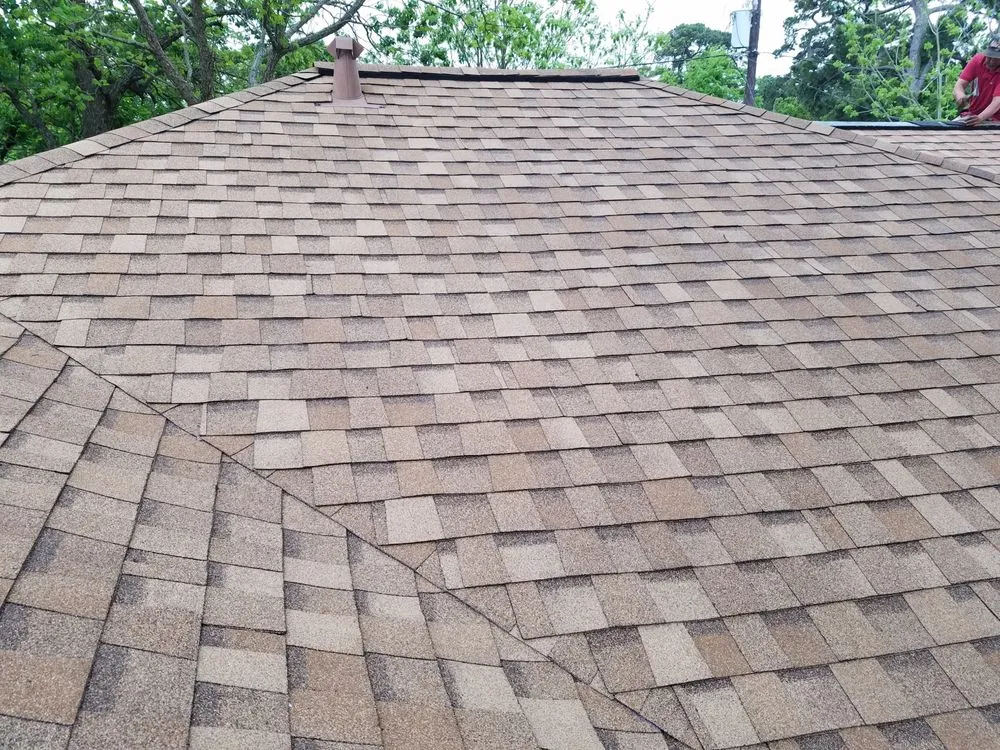 Slide of Houston Roofing Experts