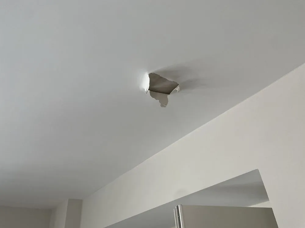 Slide of HR Roofing Solutions