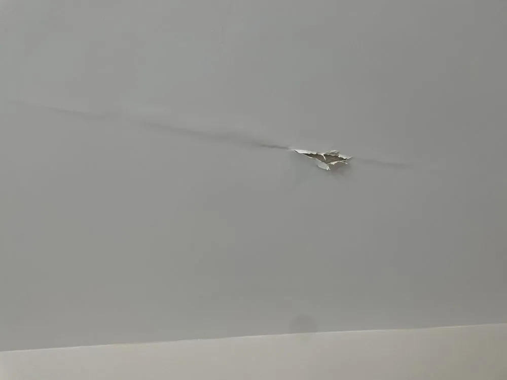 Slide of HR Roofing Solutions