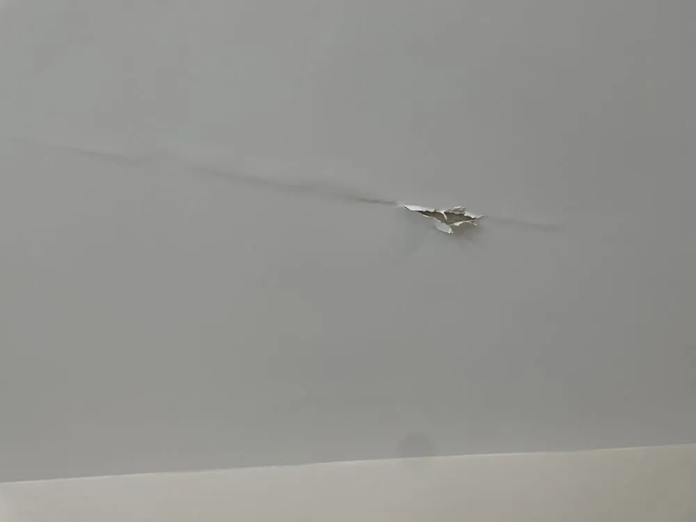 Slide of HR Roofing Solutions