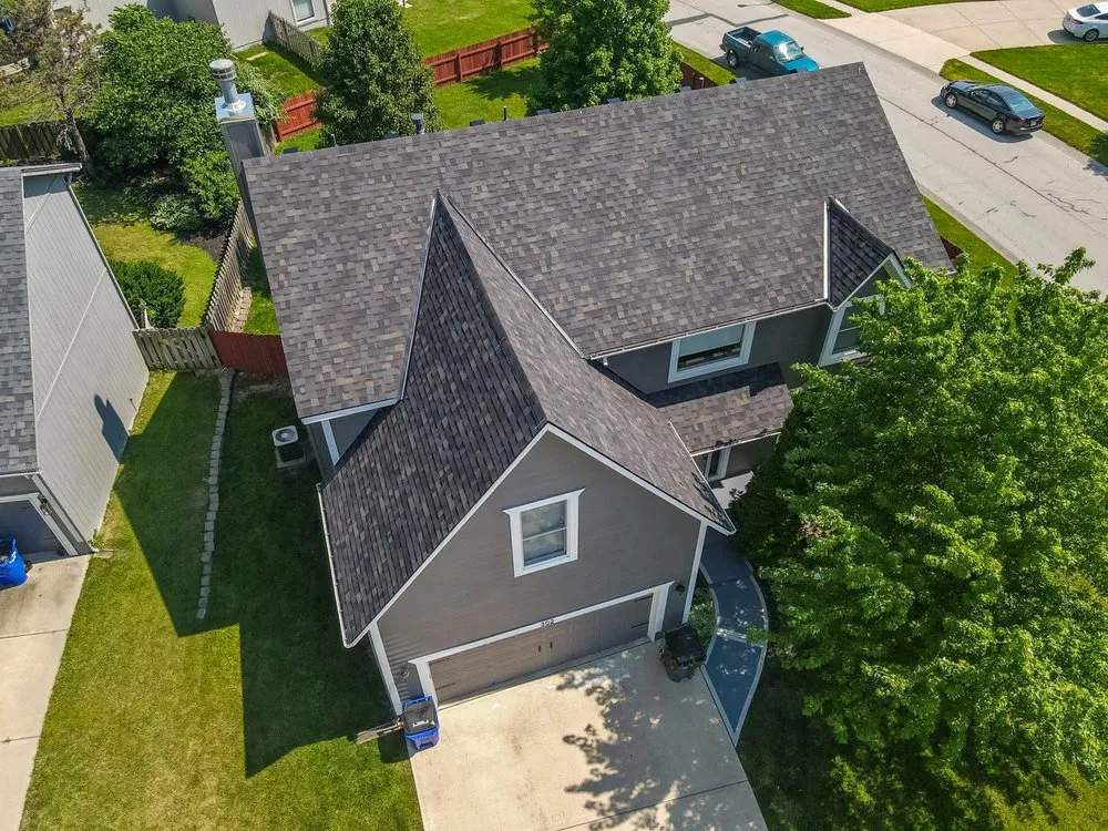 Slide of HT Roofing & Construction