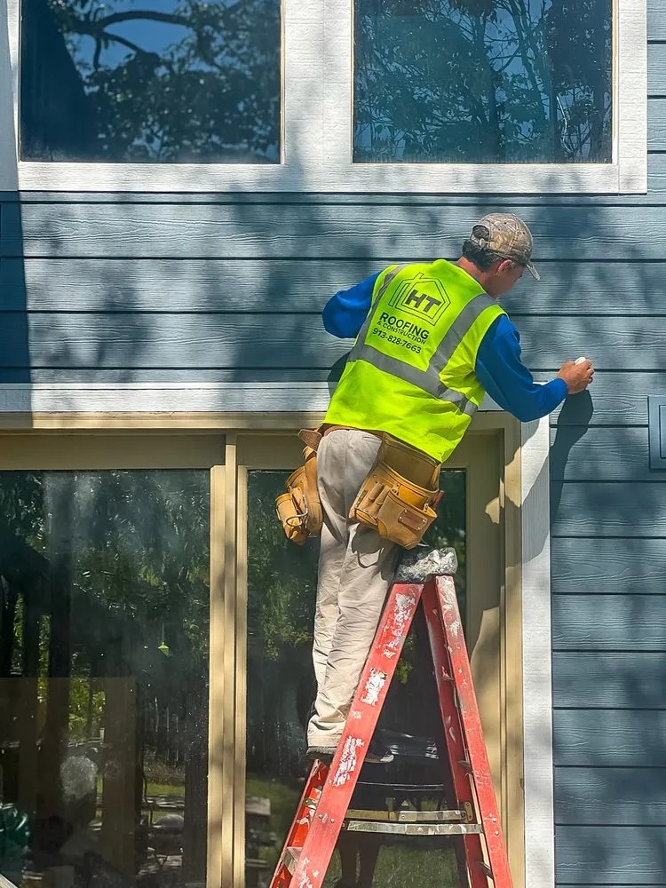 Slide of HT Roofing & Construction