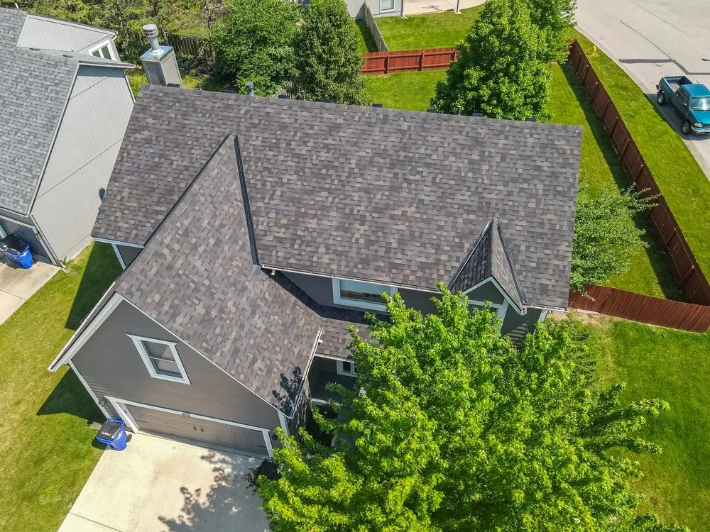 Slide of HT Roofing & Construction