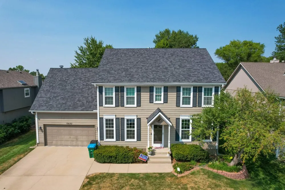 Slide of HT Roofing & Construction