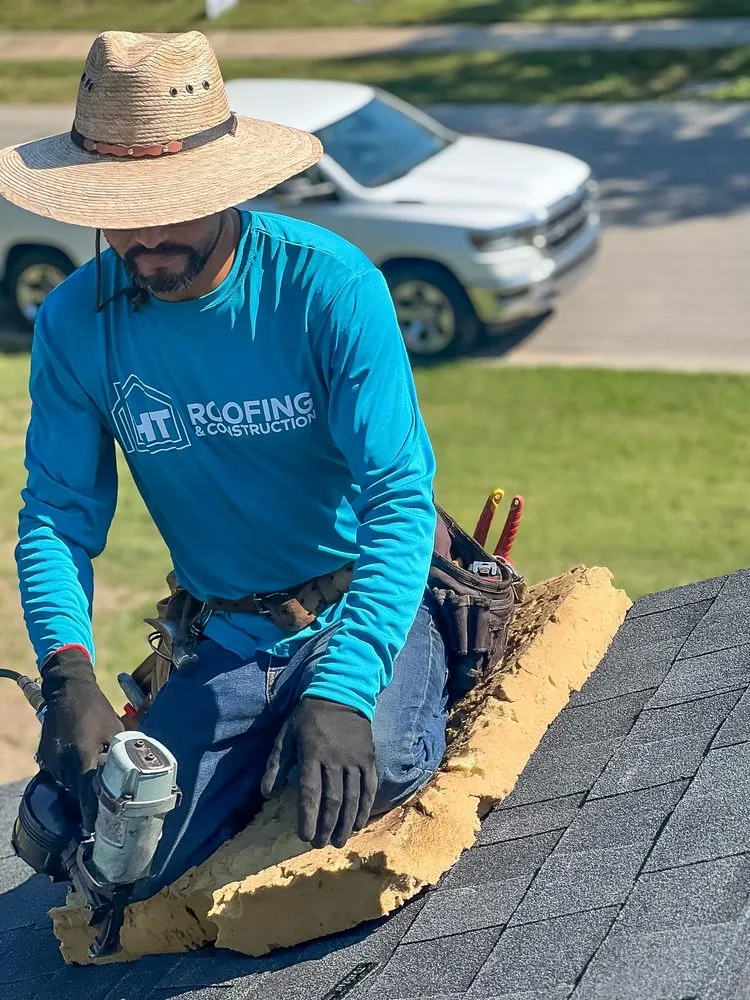 Slide of HT Roofing & Construction