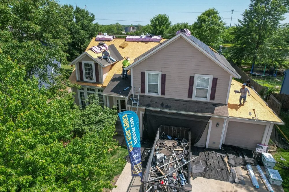 Slide of HT Roofing & Construction