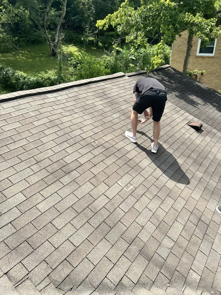 Slide of H&T Roofing