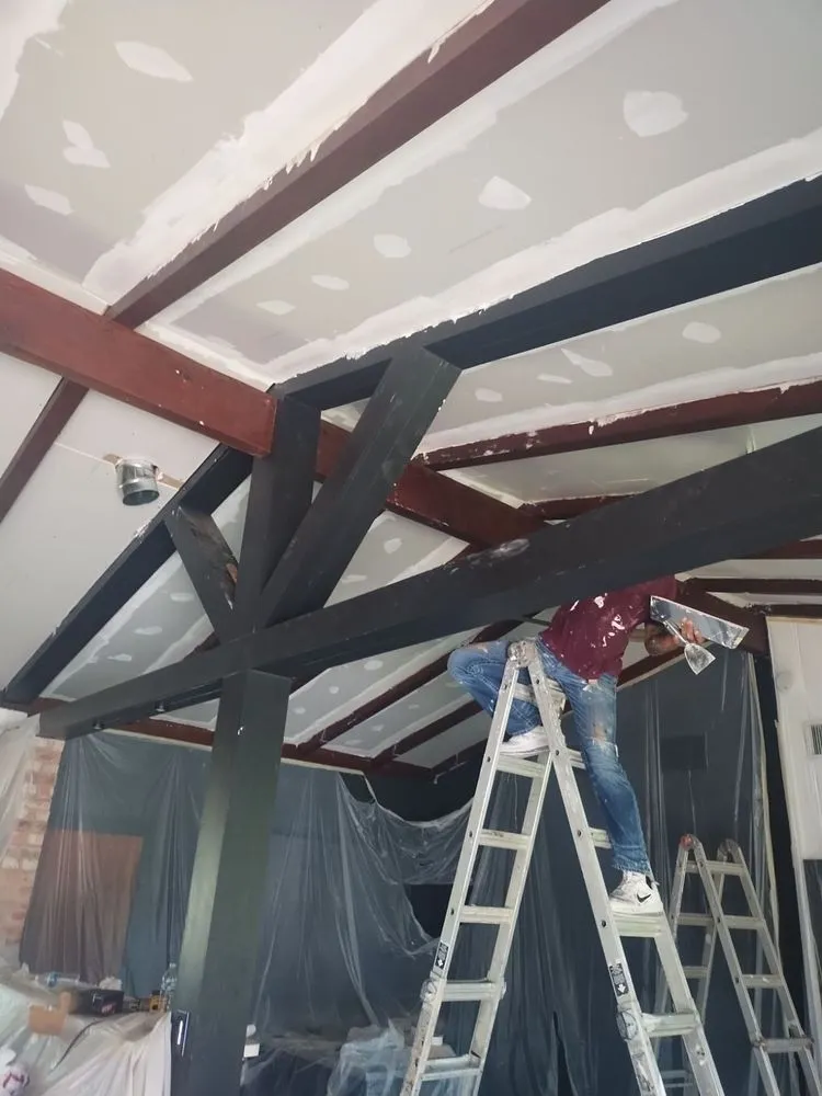 Slide of HTX Roofing & Restoration