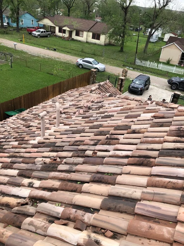 Slide of HTX Roofing and General Construction