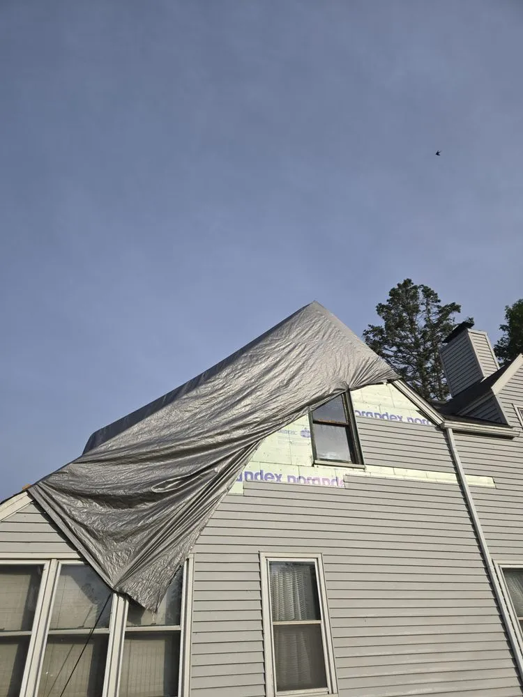 Licensed storm damage roof repair for fast service in Fair Haven, MI by Hubbard Home Improvements