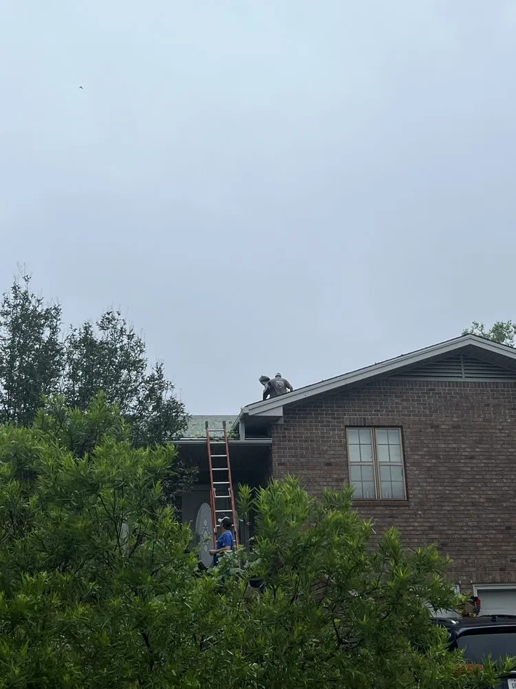 Slide of Hubbert Roofing