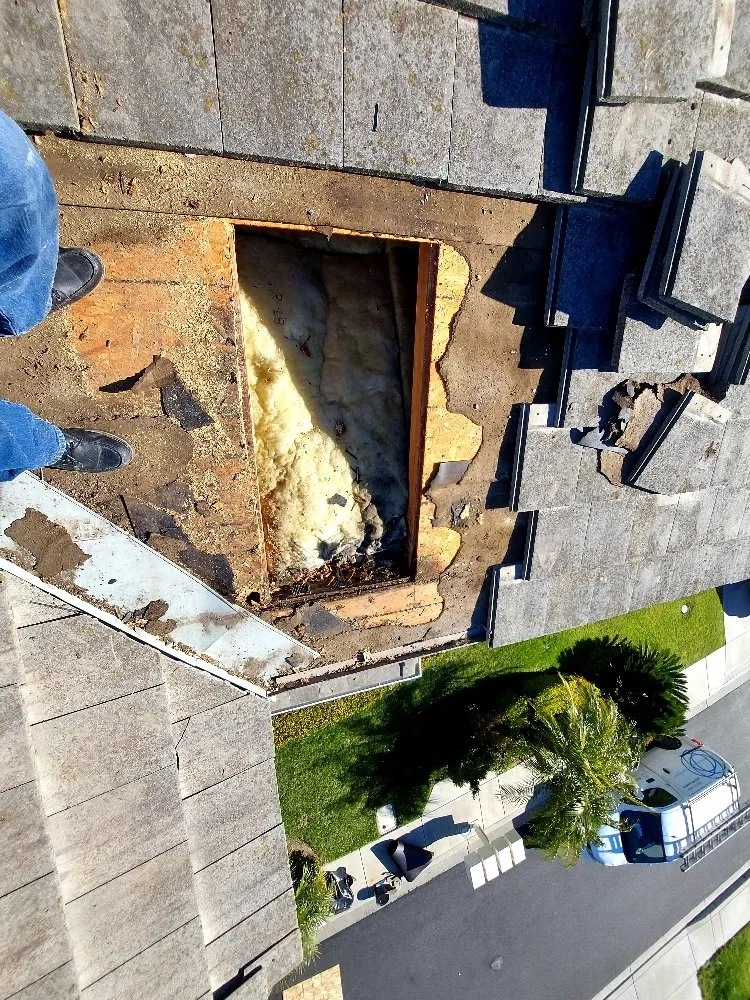 Slide of Huertas roofing