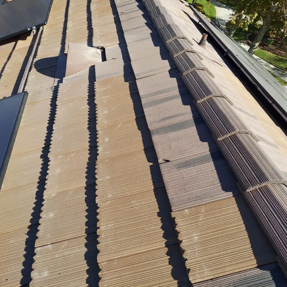 Slide of Huertas roofing