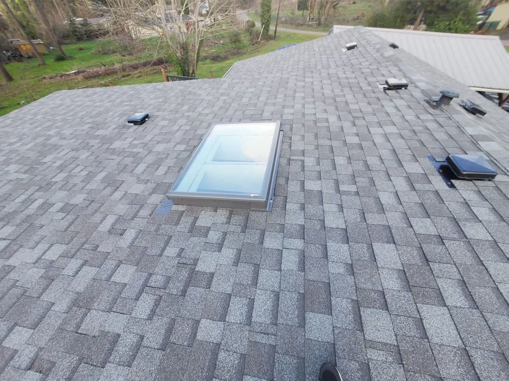 Slide of Huey & Sons Roofing