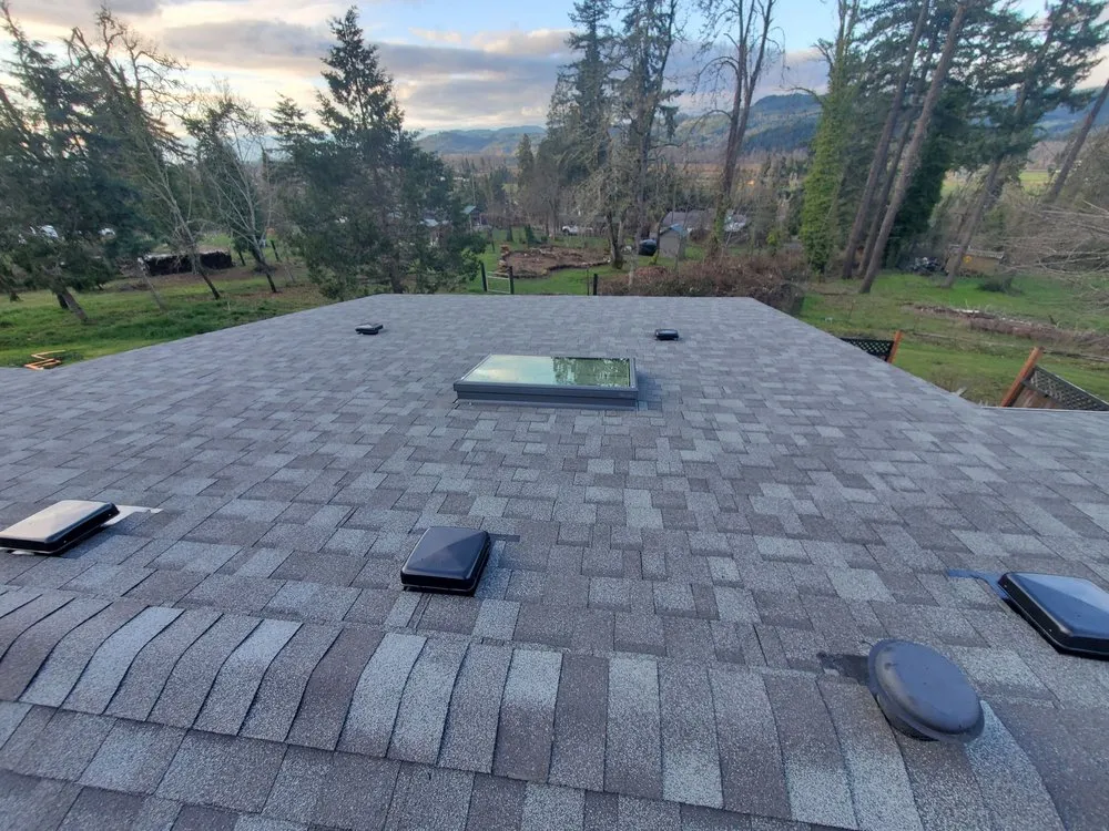 Slide of Huey & Sons Roofing