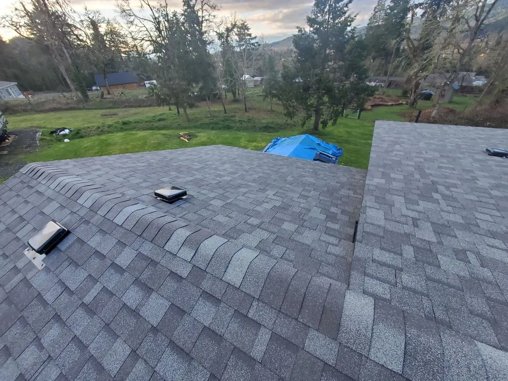 Slide of Huey & Sons Roofing