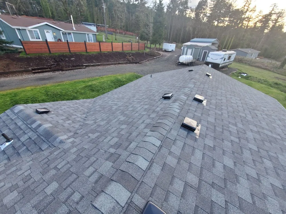 Slide of Huey & Sons Roofing