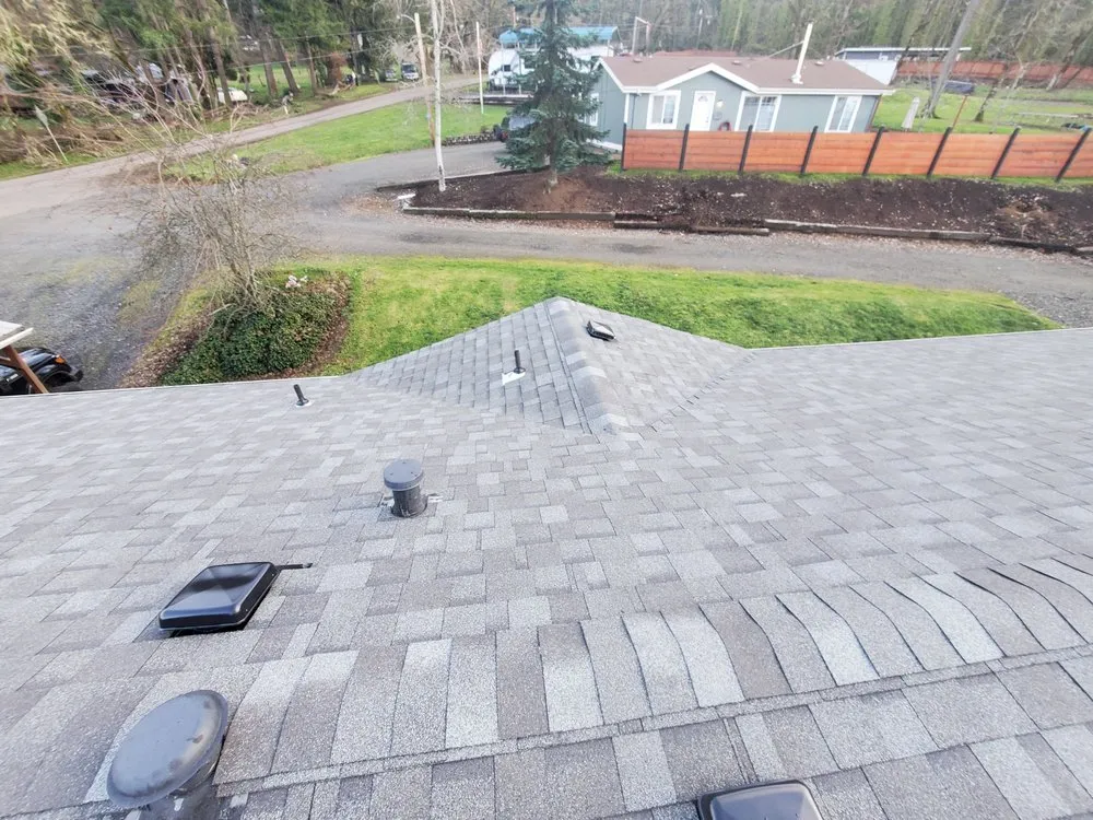 Slide of Huey & Sons Roofing