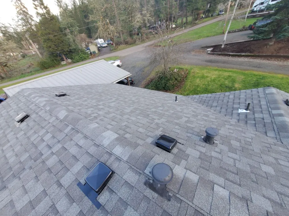 Slide of Huey & Sons Roofing