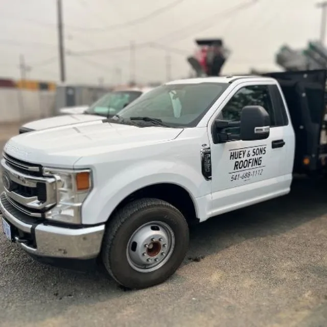 Slide of Huey & Sons Roofing