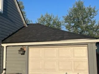 Slide of Huey & Sons Roofing