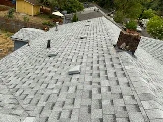 Slide of Huey & Sons Roofing