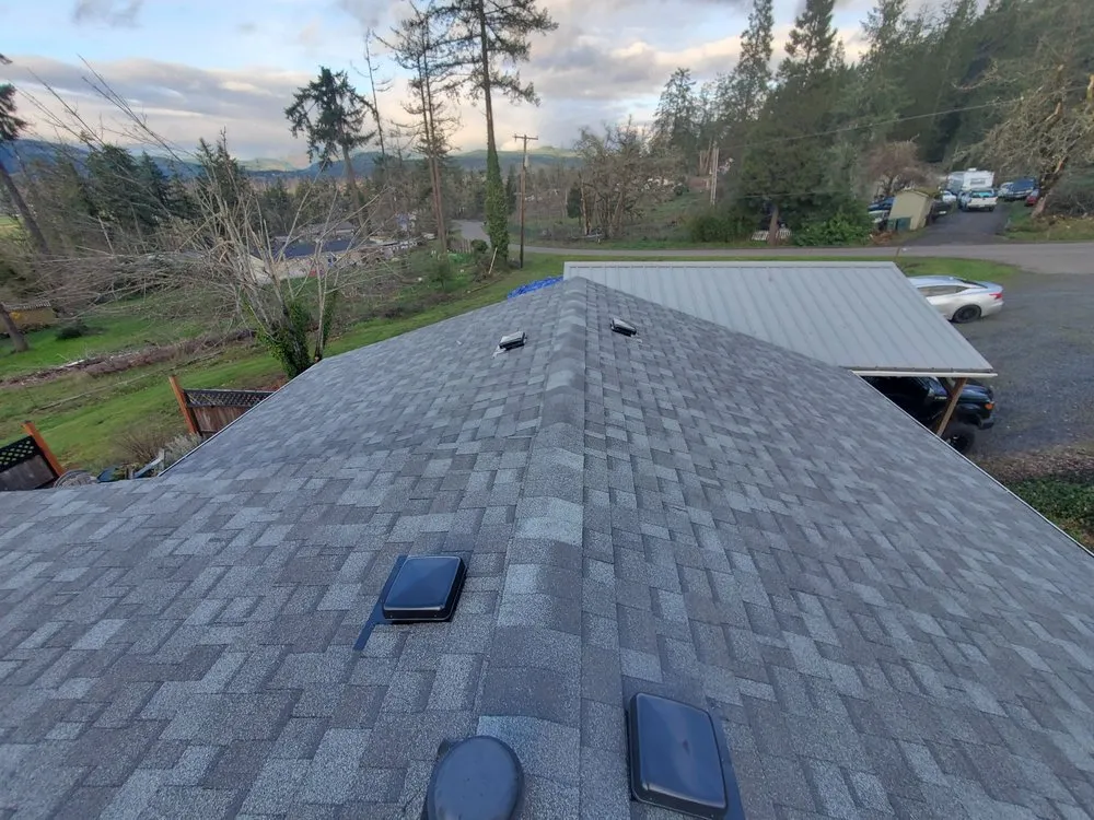 Slide of Huey & Sons Roofing