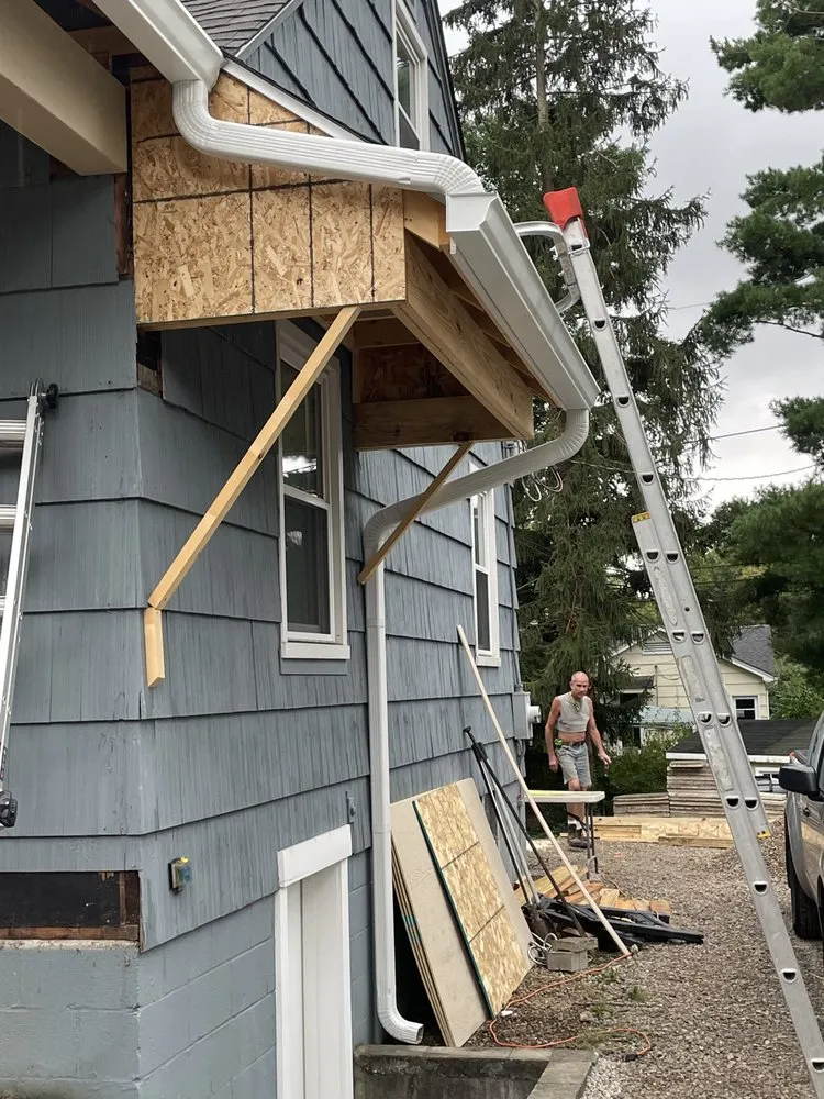 Slide of Hughes Seamless Gutters