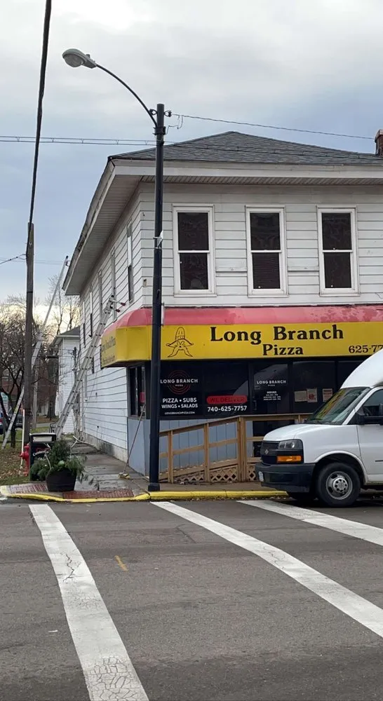 Slide of Hughes Seamless Gutters