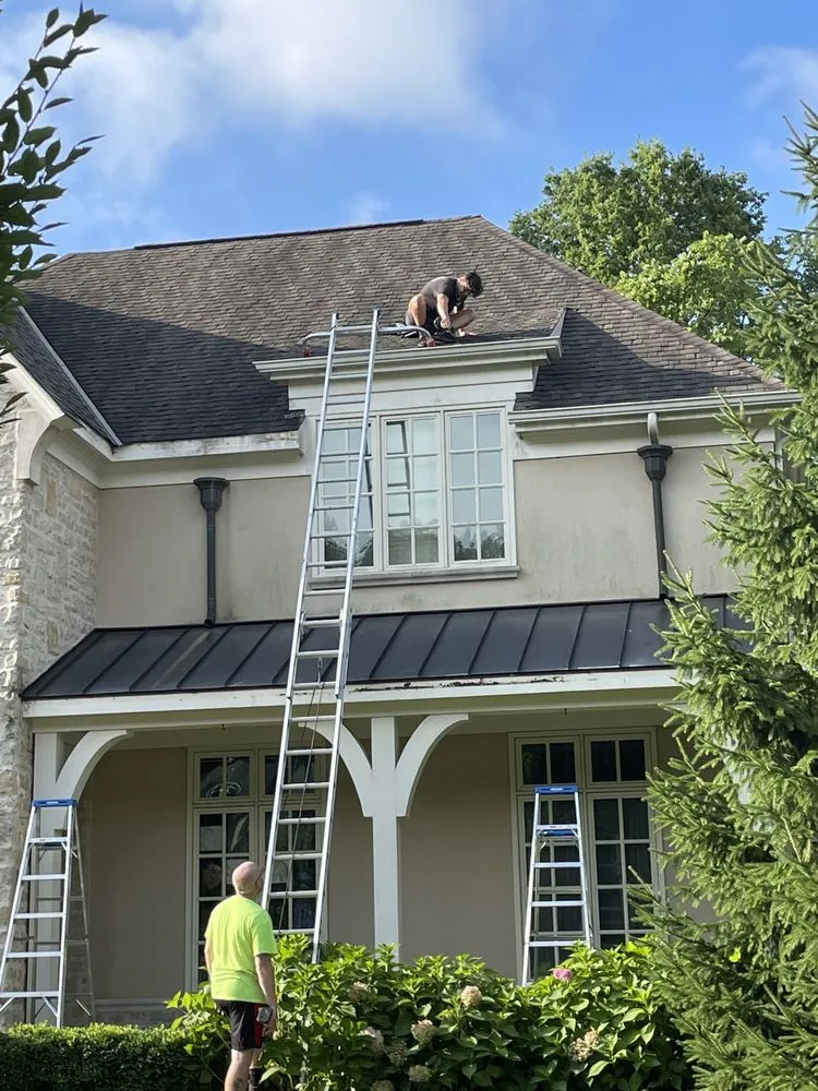 Slide of Hughes Seamless Gutters